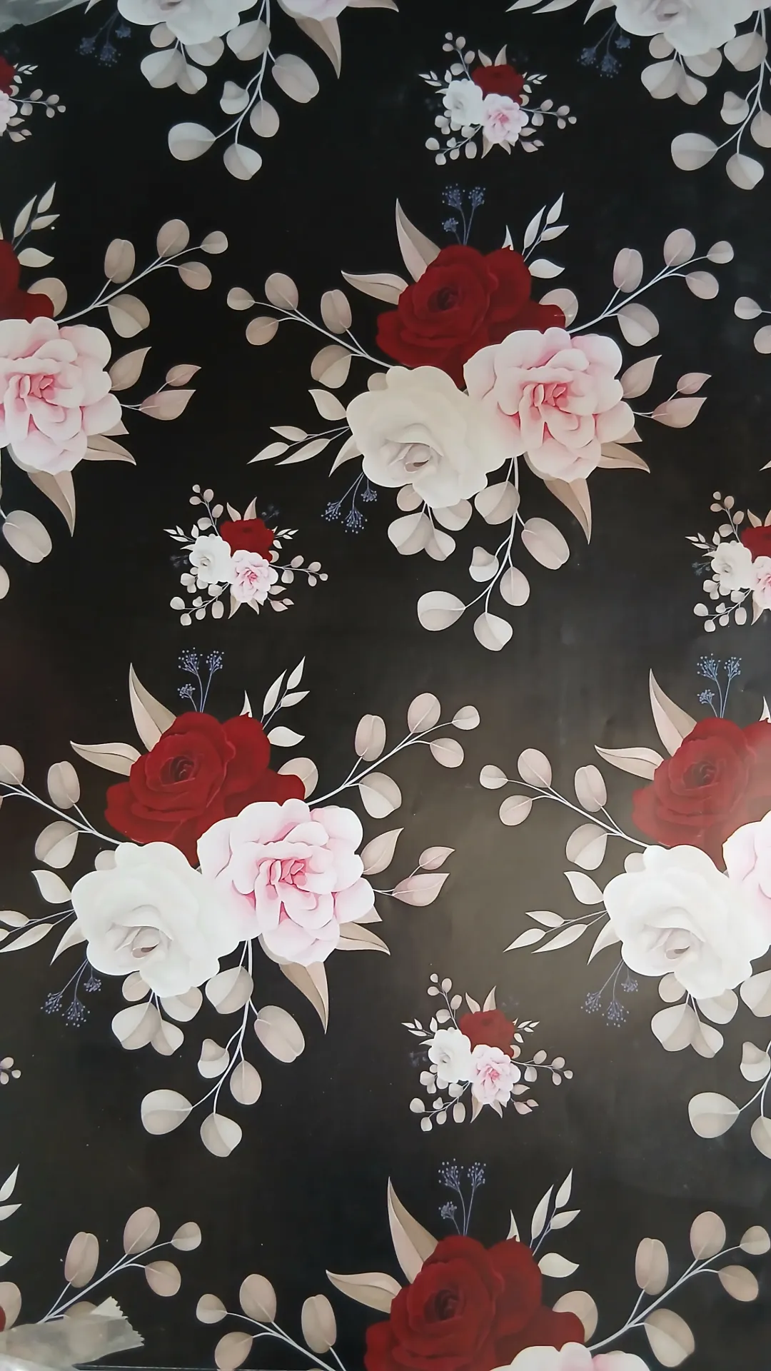 Papier cadeau couché (Noir avec 3 fleur)